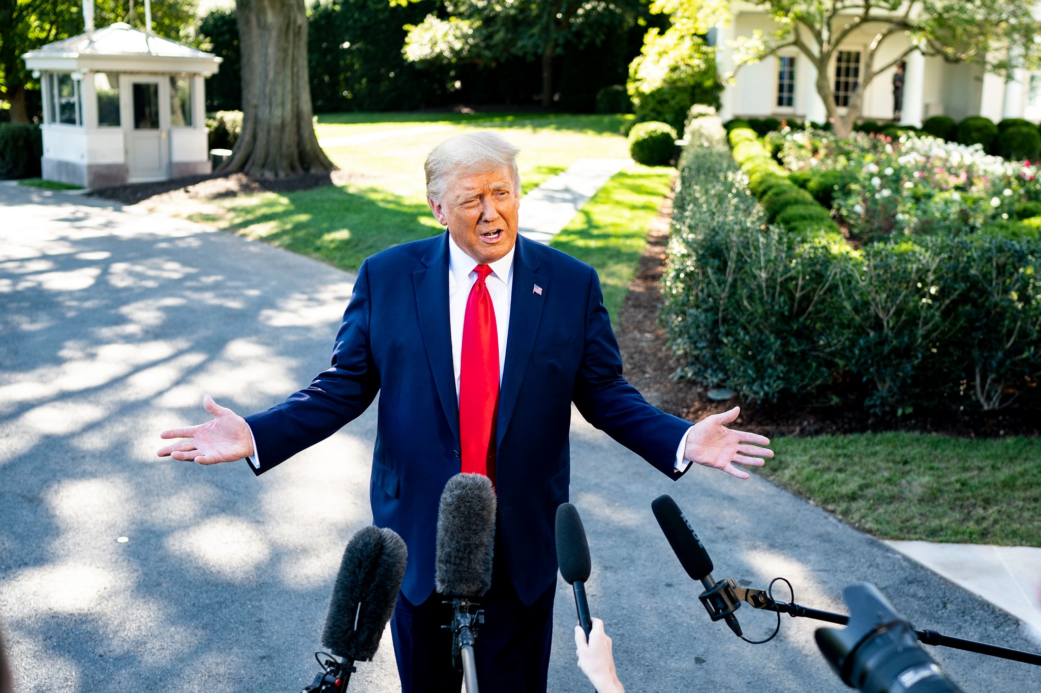 Trump in front of microphones