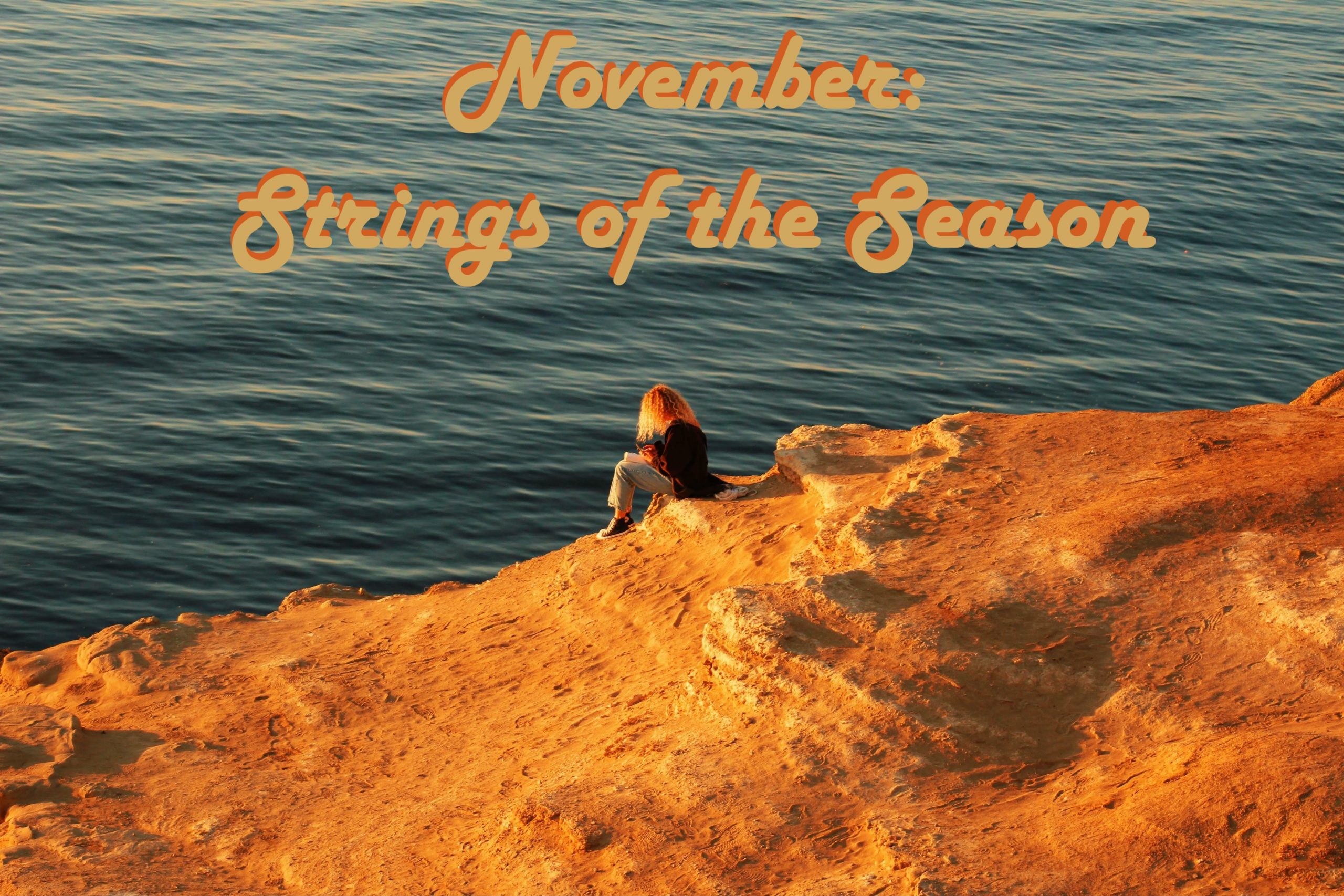 Woman sitting on Sunset Cliffs San Diego