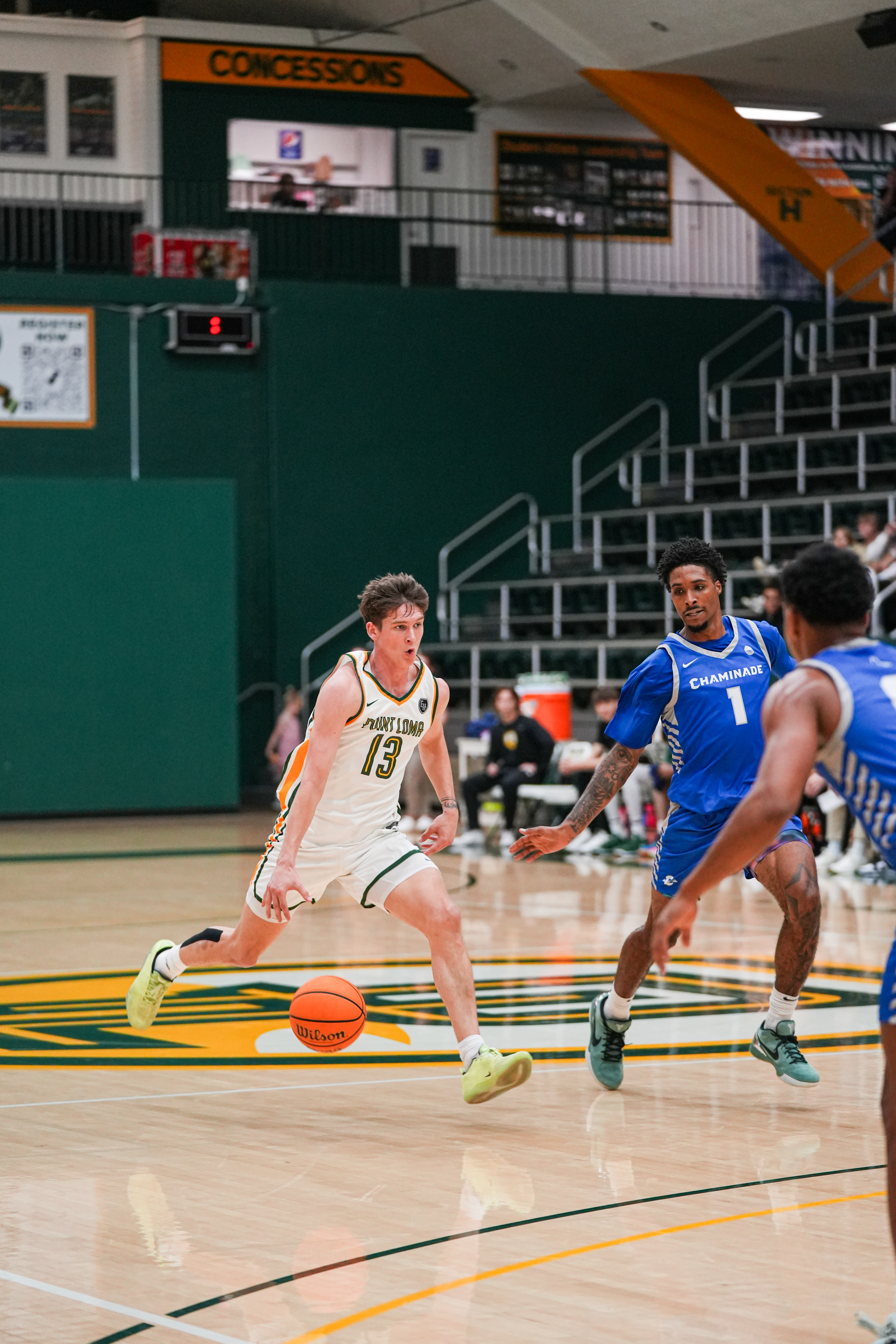 Senior Zackry Paulsen driving the ball in the Jan. 18 game against Chaminade. Photo credit to Shannon Hardy courtesy of PLNU Smug Mug.
