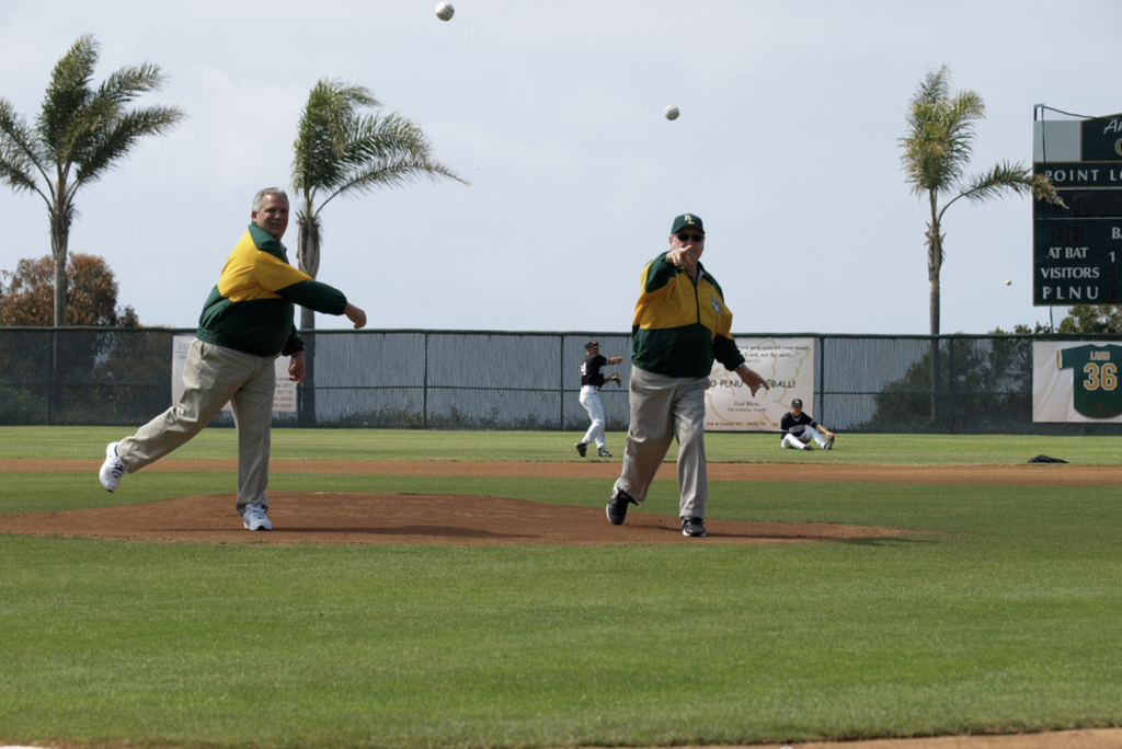 Decker and Land pitch together at their jersey retirement ceremony in April of 2008. Photo credit to Bob Naegele courtesy of his Zenfolio.