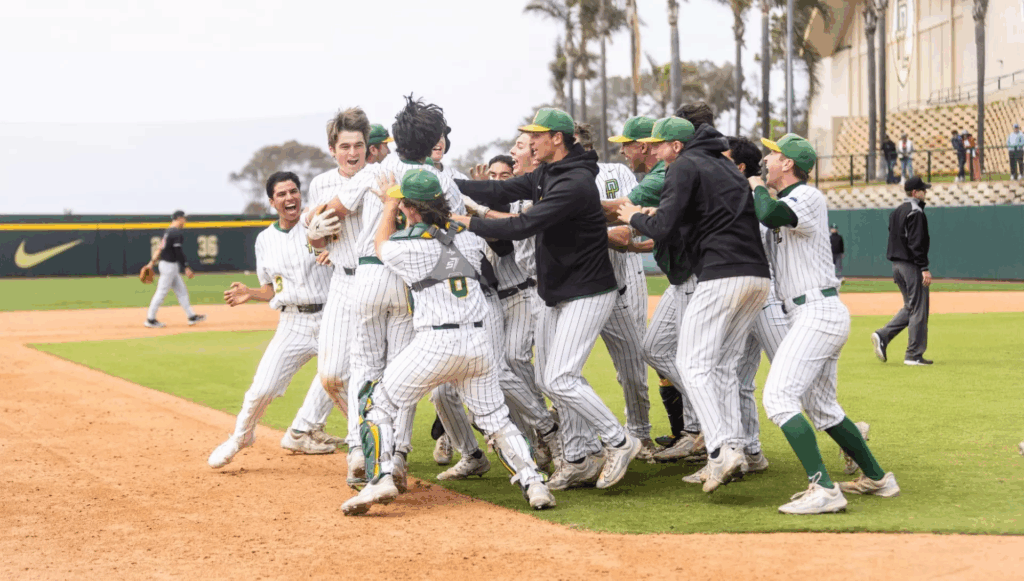 PLNU baseball celebrating a walkoff win against Azusa Pacific University on April 25.
